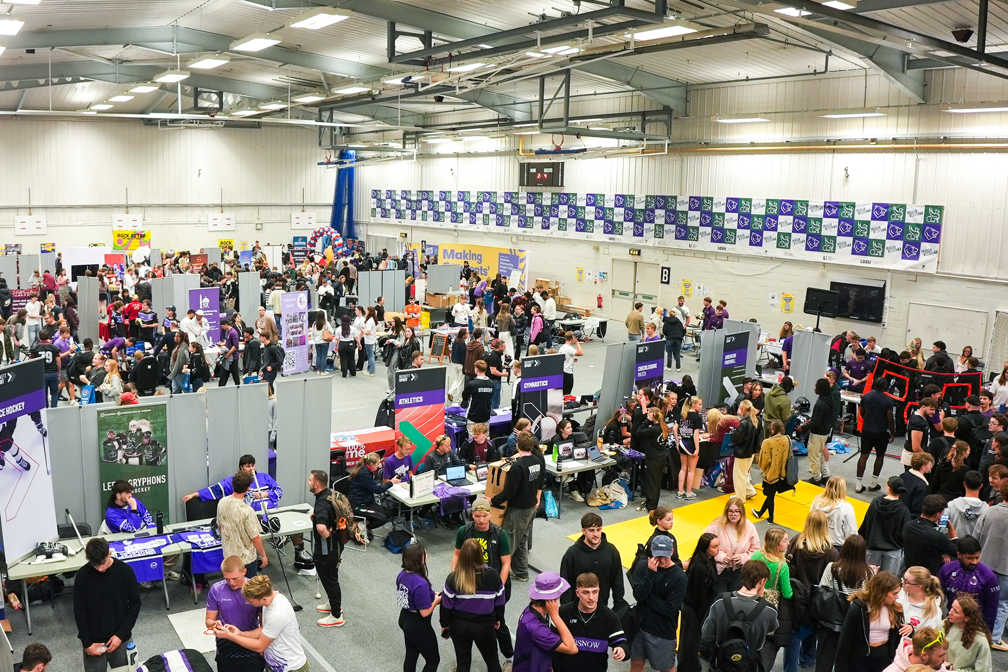 An aerial view of LBSU Freshers Fair, packed with hundreds of students
